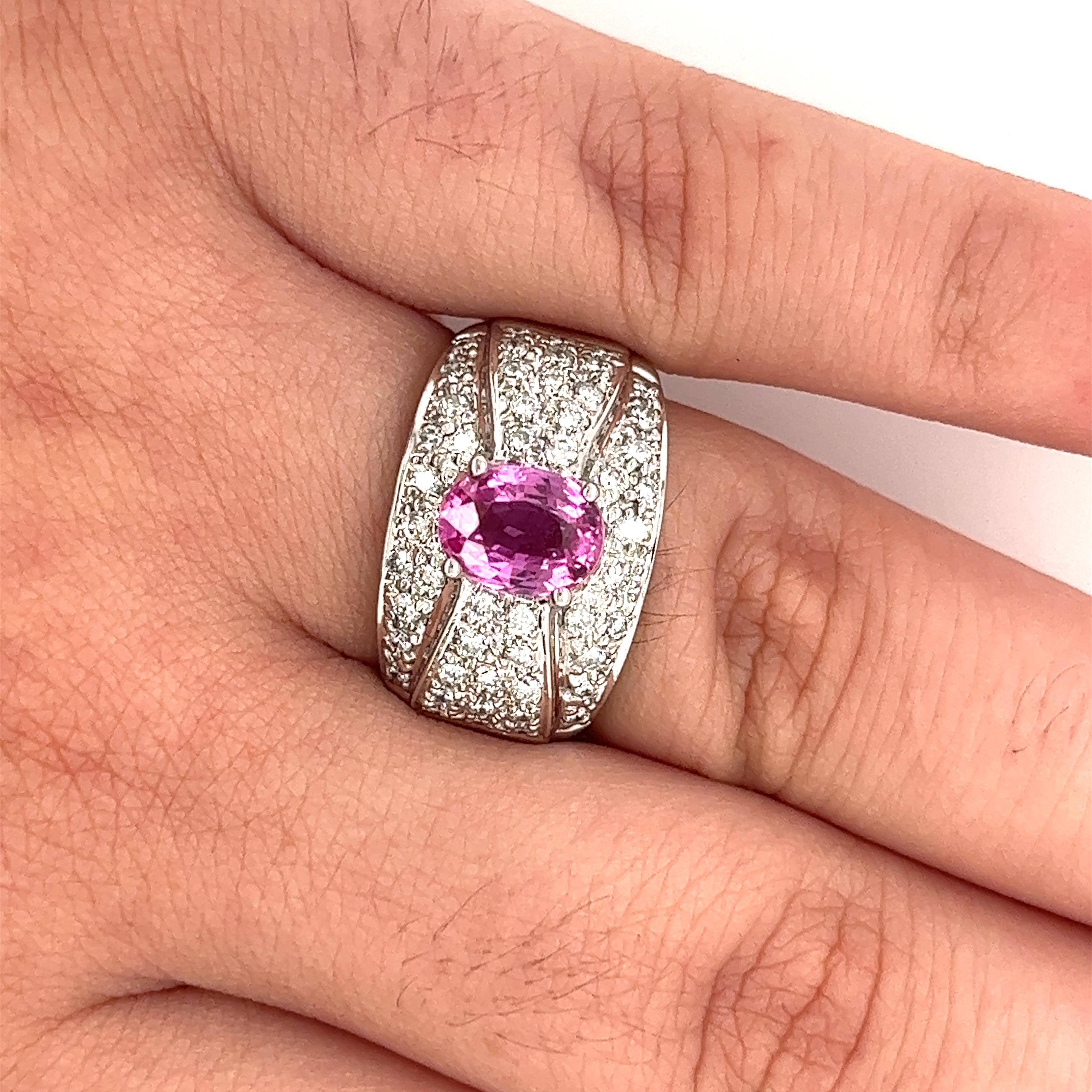 Modern Natural 2 Carat Oval Cut Pink Sapphire with Diamond Cluster Dome Ring For Sale