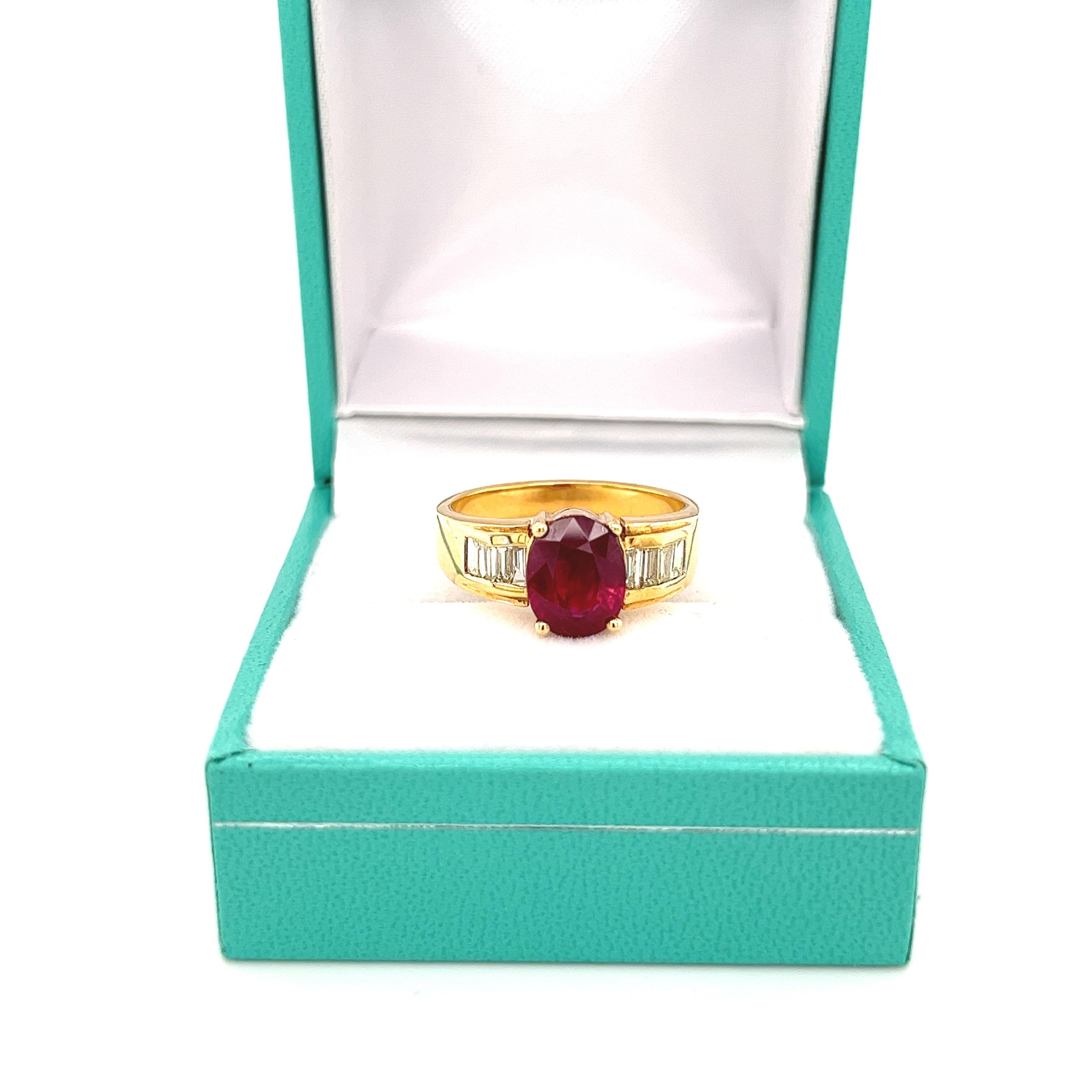 Art Deco Natural 2 Carat Oval Cut Ruby and Baguette Cut Diamond Sides in 18K Gold Ring For Sale