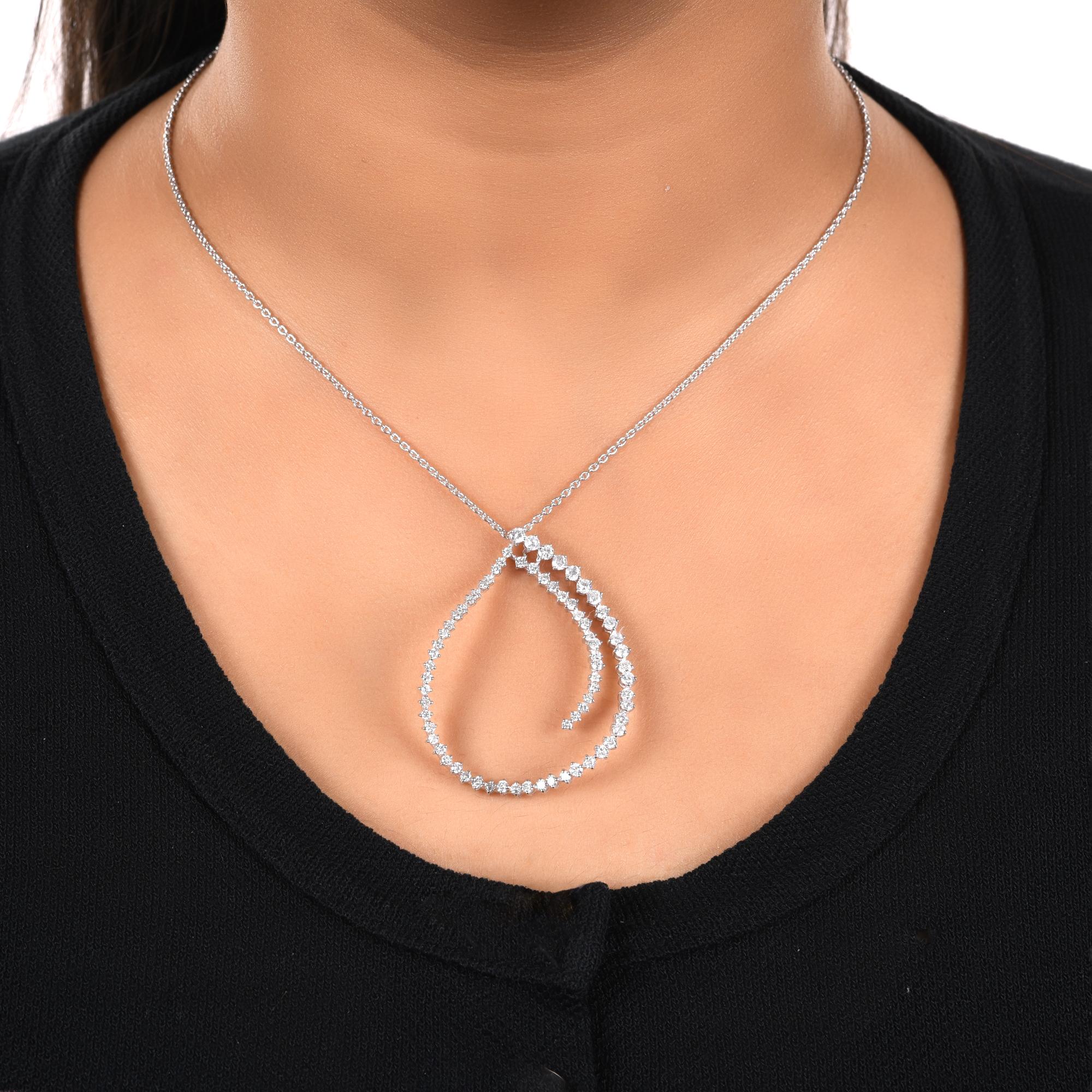 This Natural 2 Carat SI Clarity HI Color Diamond Loop 14k White Gold Pendant Necklace features graduated small to large diamonds set in a pear shape loop which overlaps the design on the top of the pear. 
Diamonds are a universal symbol of eternity