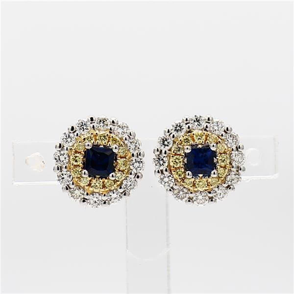 RareGemWorld's classic natural round cut sapphire earrings. Mounted in a beautiful 18K Yellow and White Gold setting with natural round cut blue sapphires. The sapphires are surrounded by natural round white diamond melee and natural round yellow