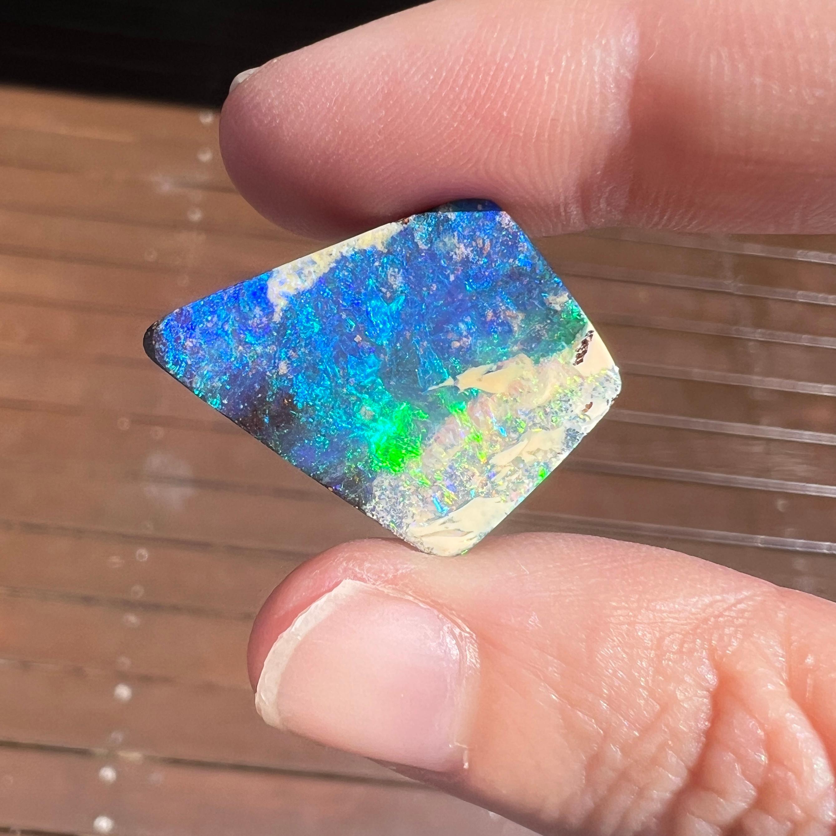 Cabochon Natural 20.39 Ct Australian kite-shaped boulder opal mined by Sue Cooper For Sale