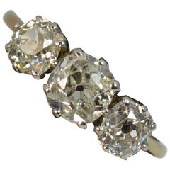 Antique Natural 2.1 Carat Old Cut 18 Carat Gold and Platinum Trilogy Ring
