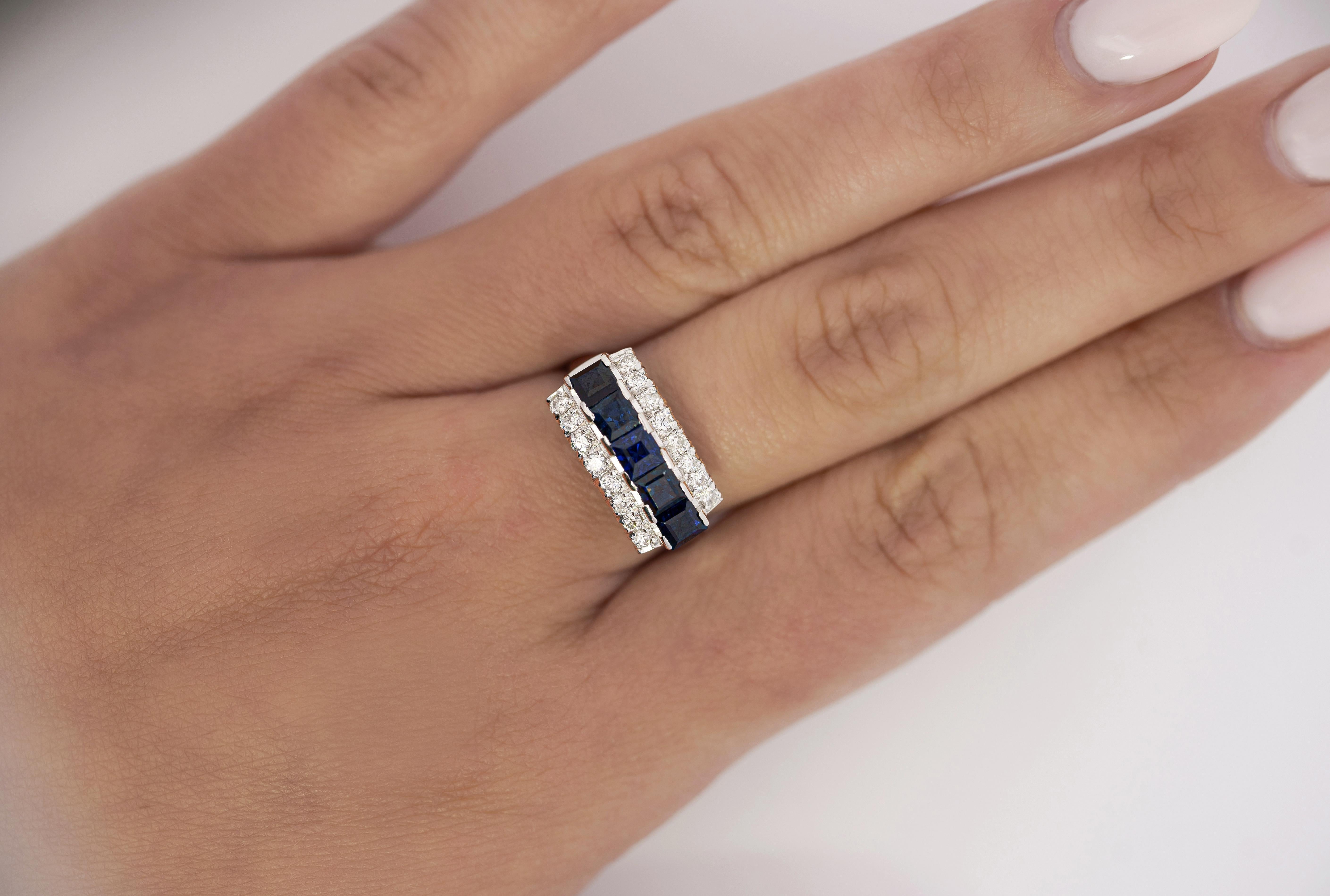 Natural Blue Sapphire and Diamond in Platinum 900 Cluster 5 Stone Ring. 

This cluster ring features 5 blue Sapphire center stones. The sapphires carry a total weight of 2.28 carats. It is paired with an additional 16 round-cut diamonds. The