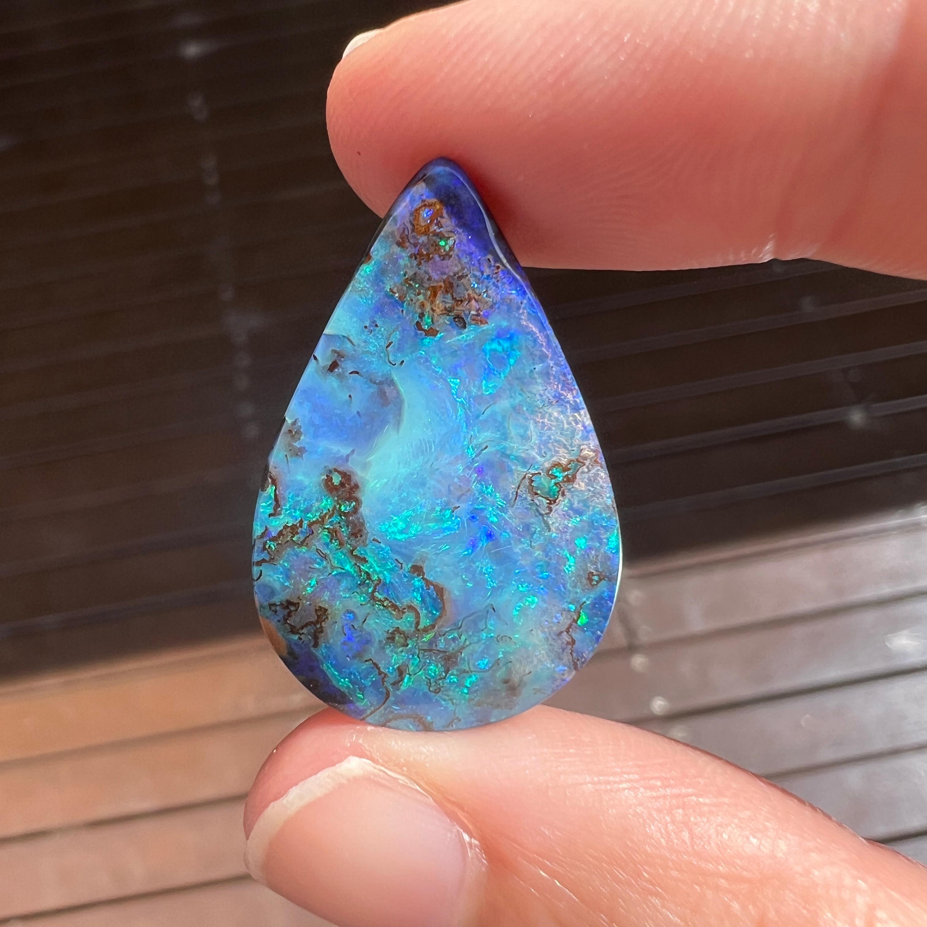 Natural 23.20 Ct large teardrop boulder opal mined by Sue Cooper For Sale 1