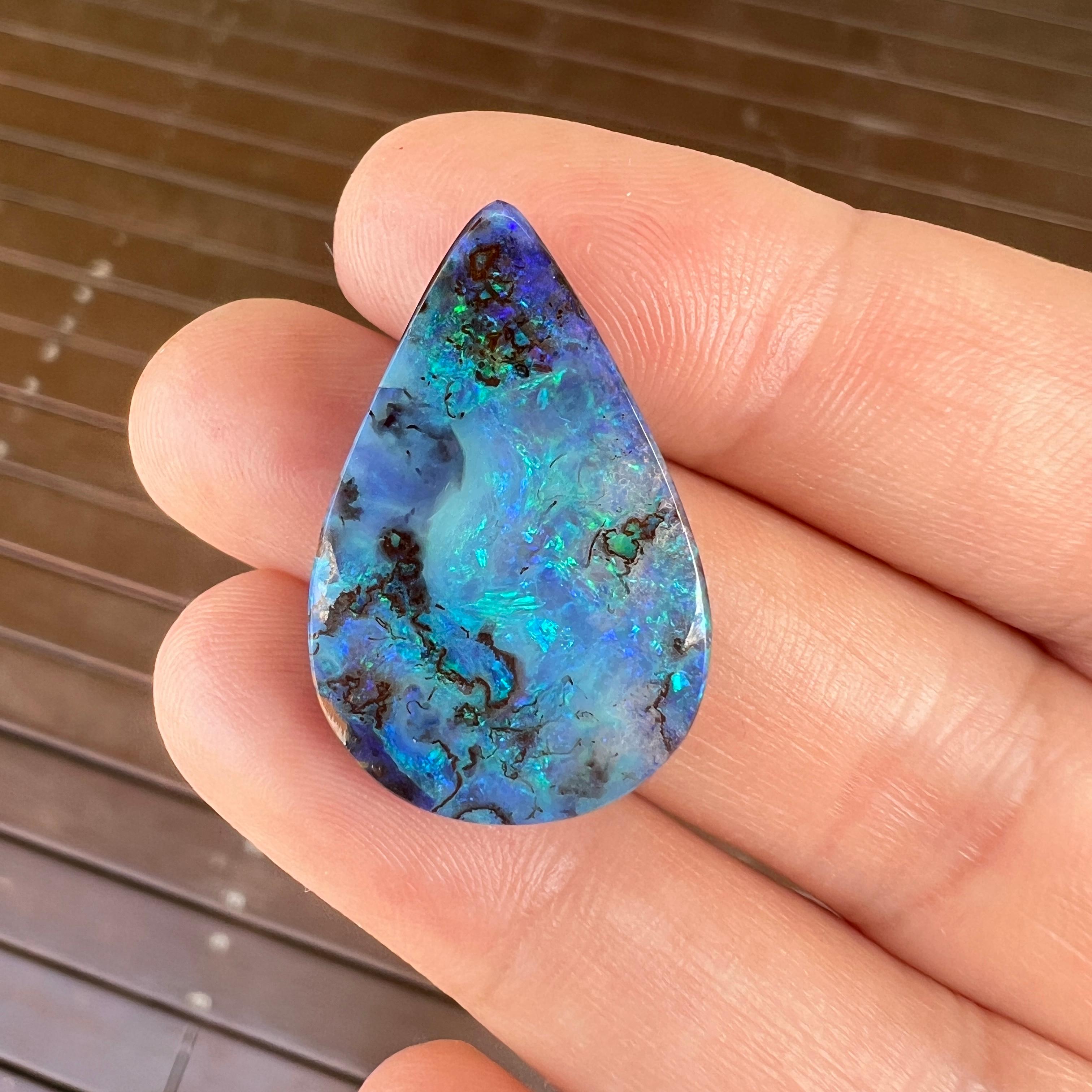 Natural 23.20 Ct large teardrop boulder opal mined by Sue Cooper For Sale 4