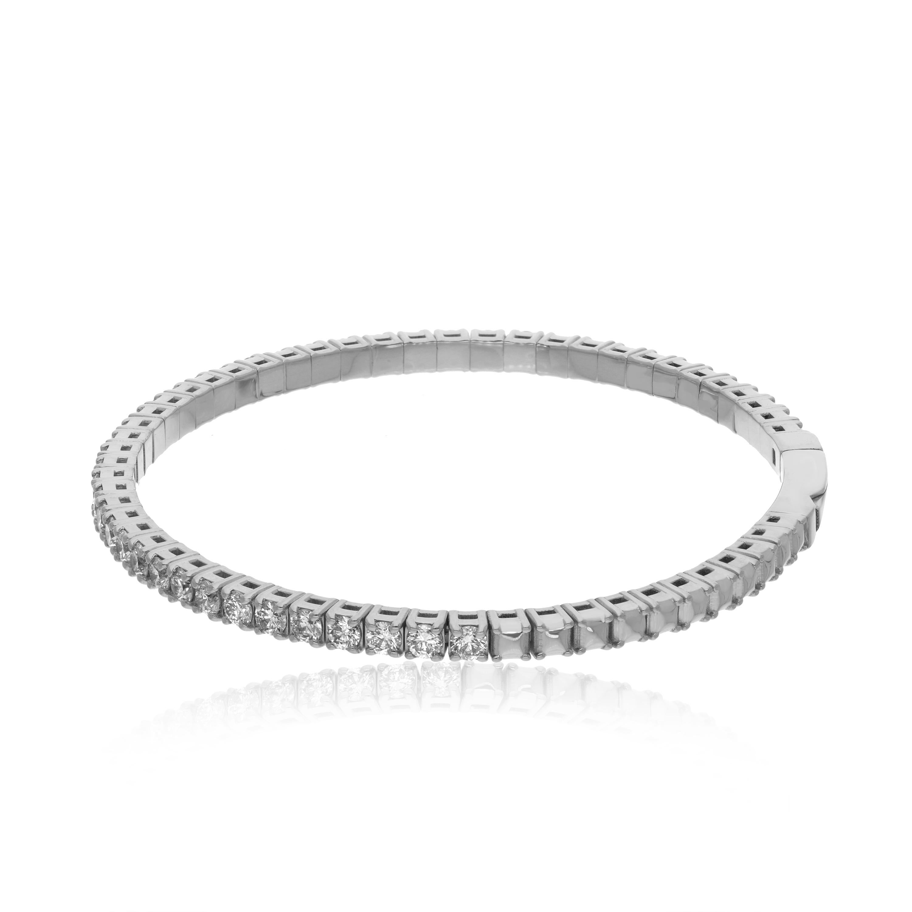 Make a statement with our stunning Gold Diamond Eternity Tennis Bracelet. Crafted with exquisite attention to detail, this piece is perfect for adding a touch of luxury to any outfit. The half eternity design features dazzling diamonds set in 14k