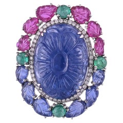 Natural, 23.91 Carats Carved Blue Sapphire, Emerald 
Ruby Cocktail Ring