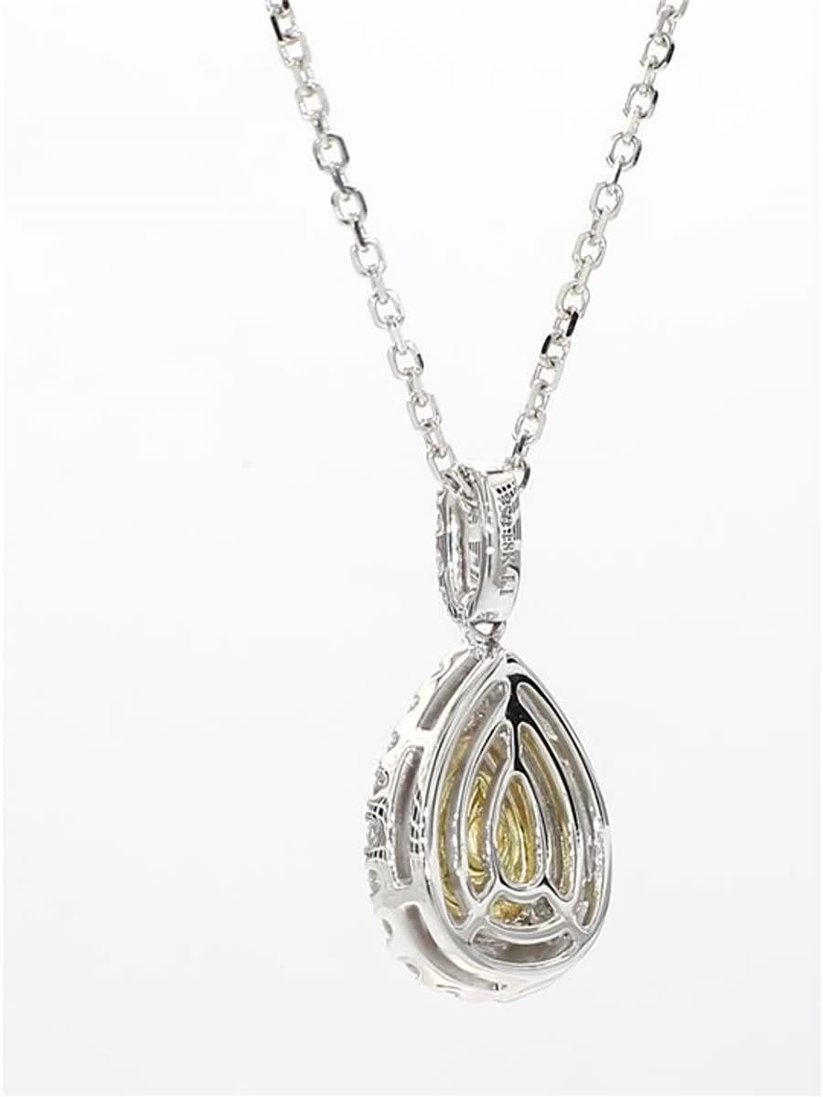 Contemporary Natural Yellow Pear and White Diamond .79 Carat TW Gold Drop Pendant For Sale