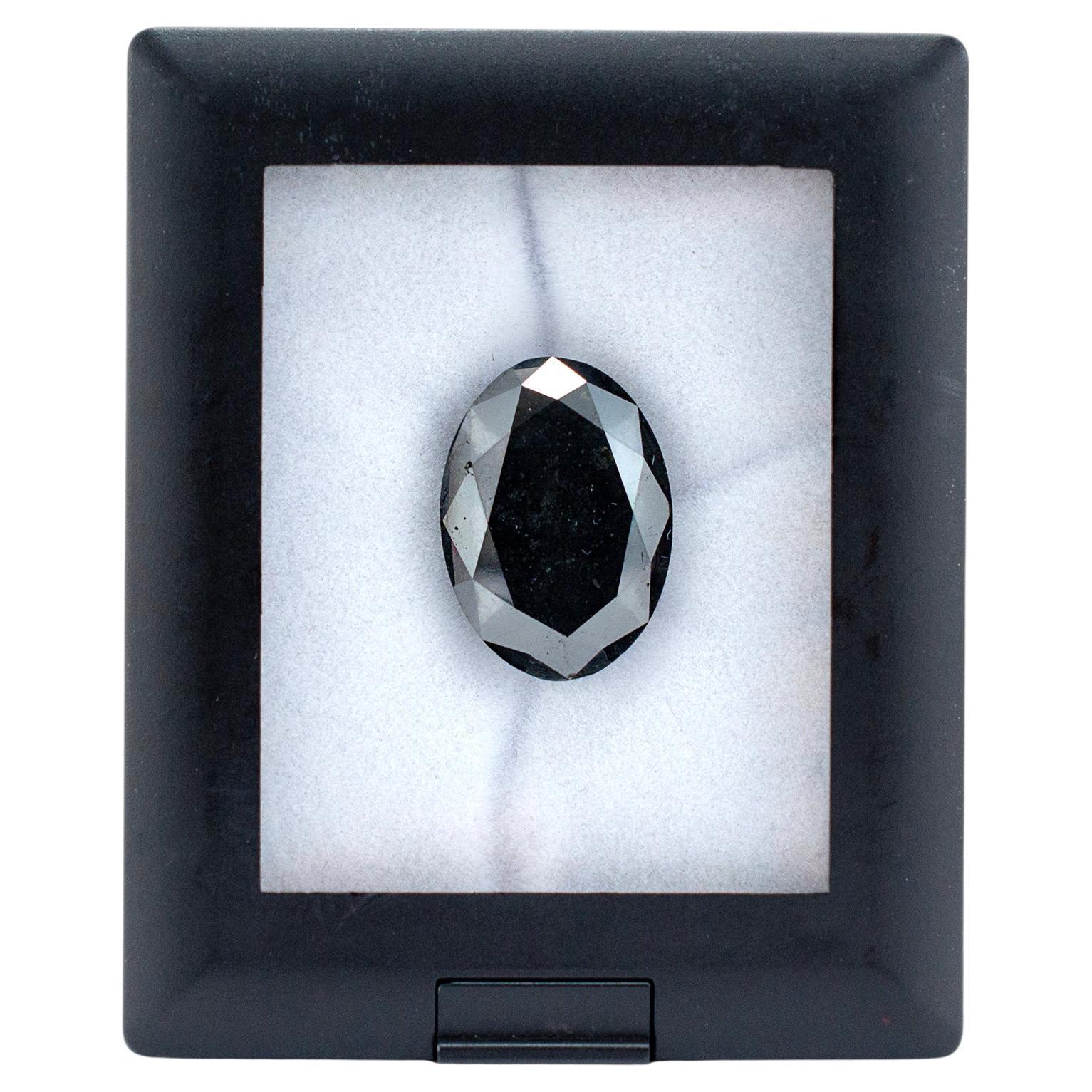 Diamante negro natural de forma ovalada de 25,13 quilates en venta