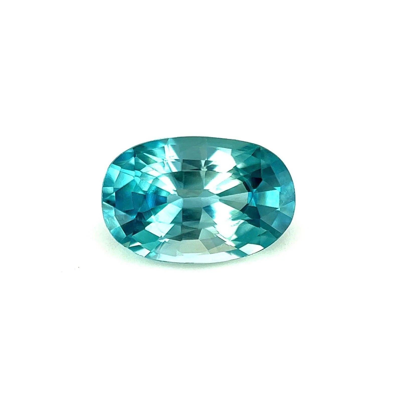 Zircon naturel bleu fluo vif taille ovale 2,58 carats, pierre précieuse non sertie, 9,5 x 63,3 mm VS