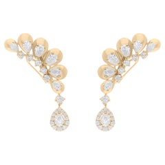 Pendientes puño de oro amarillo de 18 quilates con diamante redondo pera SI/H natural de 2,6 quilates