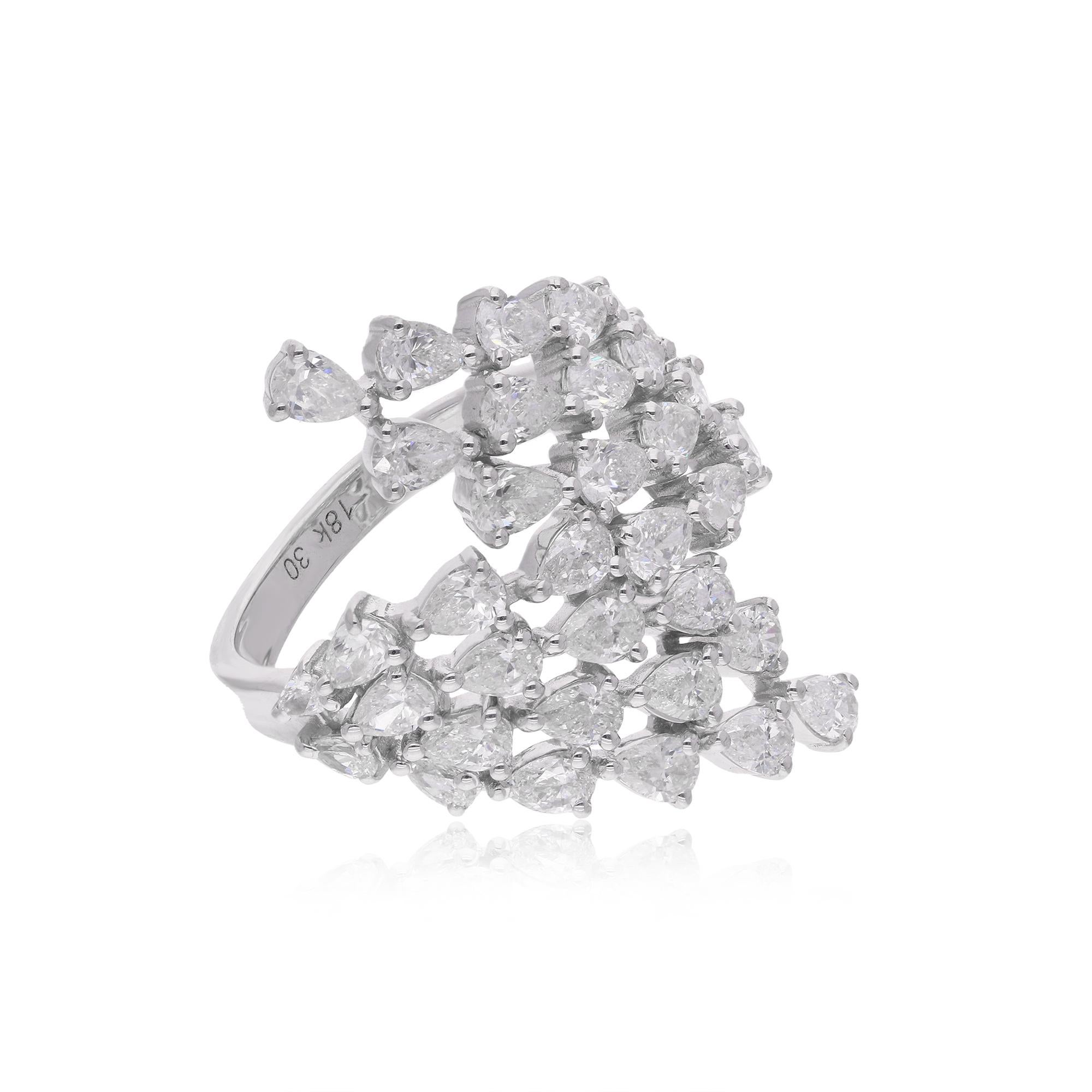 Crafted in solid 18k Gold, this ring features a cluster of sparkling diamonds, creating a truly dazzling effect. The diamonds are expertly set in a secure prong setting, ensuring that they stay in place and catch the light at every angle.

This is a