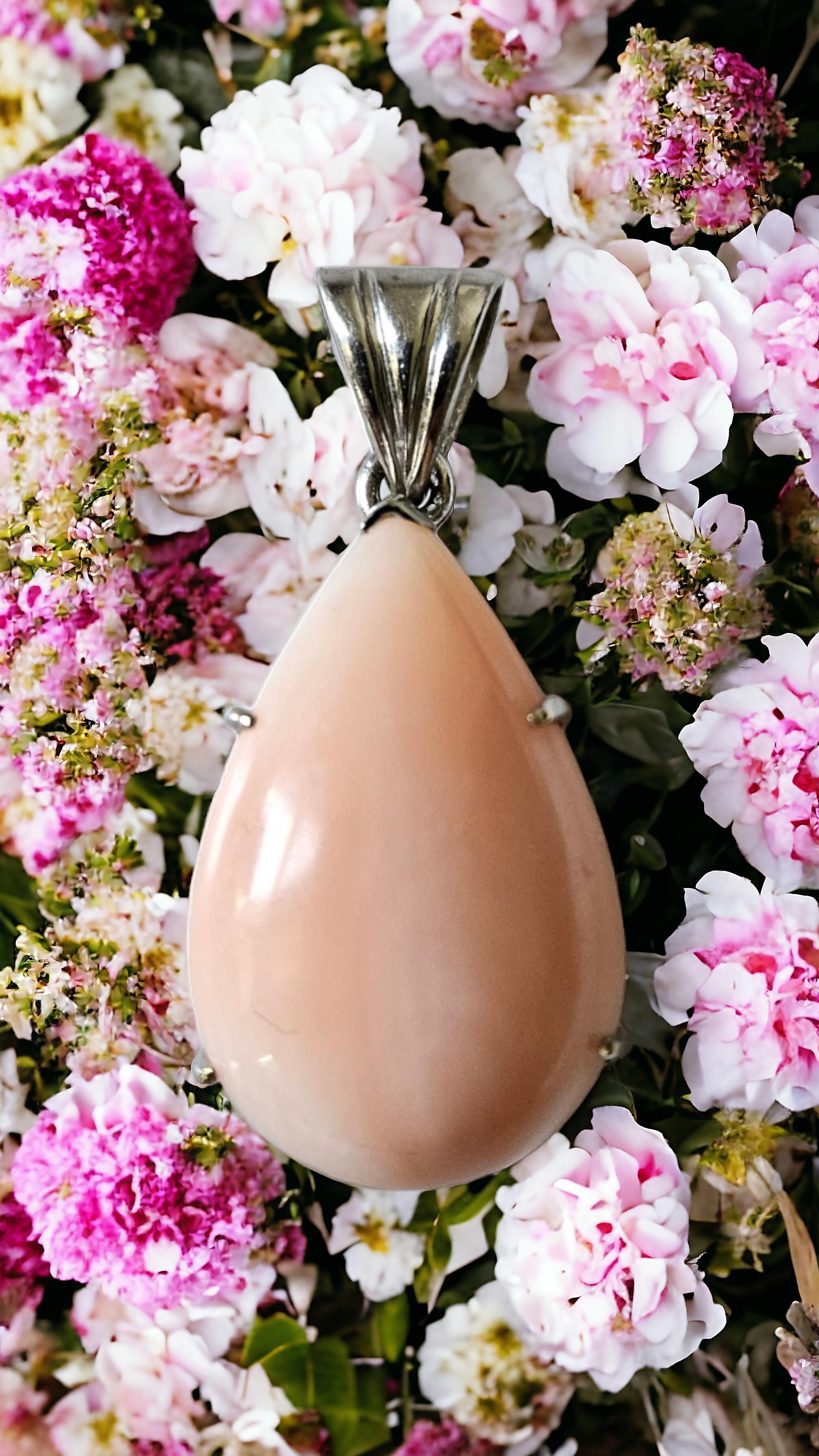 Enhance your jewelry collection with this stunning LaFrancee pendant. The 14k yellow gold pendant features a natural certified angel skin coral stone in a beautiful orange-pink color. The pendant's theme is inspired by nature and would make a