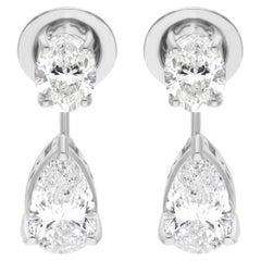 Boucles d
oreilles en or blanc 18 carats avec diamants ovales et poire naturels de 2,72 carats