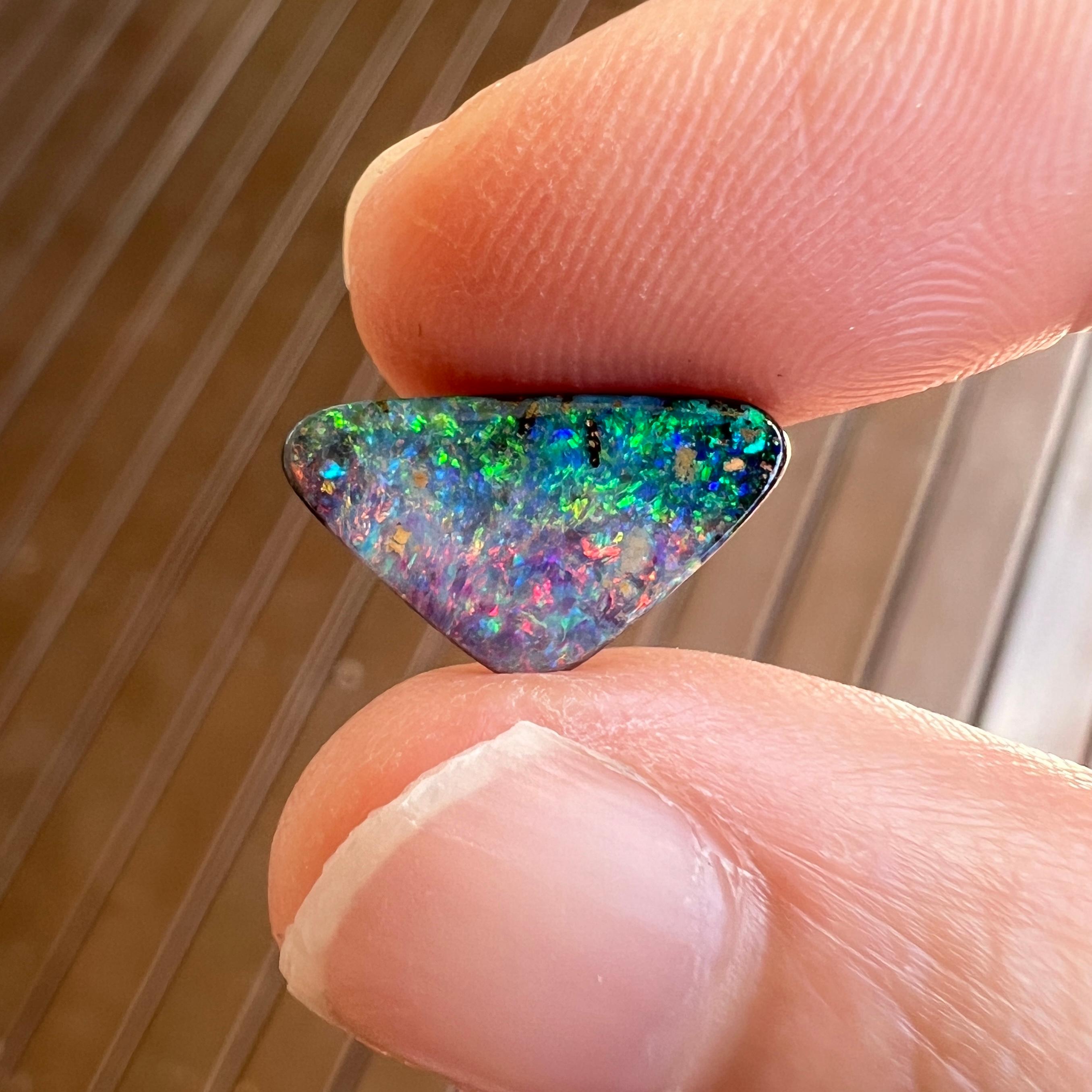 Cabochon Natural 2.75 Ct Australian green and pink black boulder opal mined by Sue Cooper For Sale