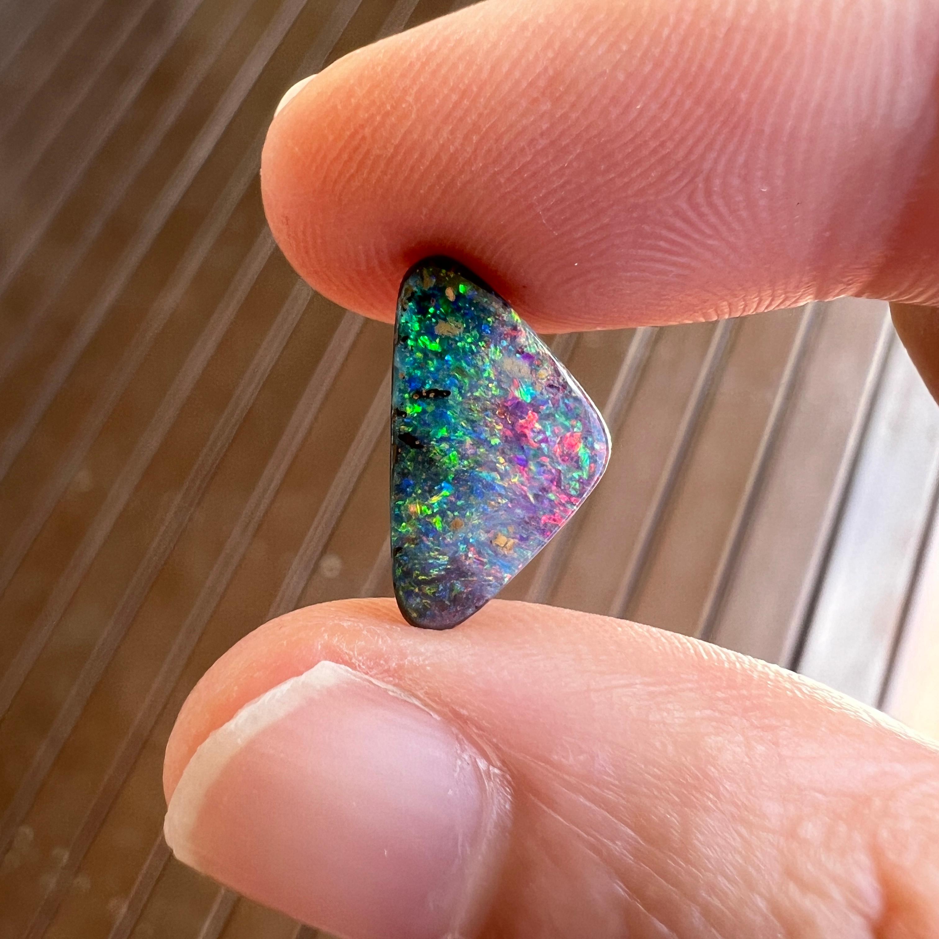 Cabochon Natural 2.75 Ct Australian green and pink black boulder opal mined by Sue Cooper For Sale