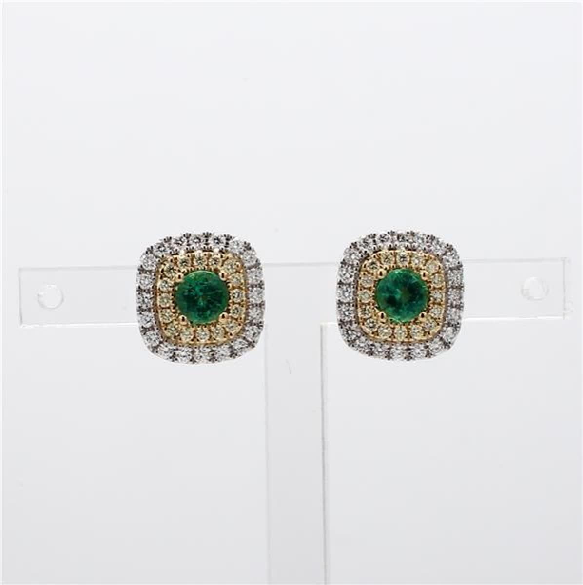 RareGemWorld's classic emerald earrings. Mounted in a beautiful 18K Yellow and White Gold setting with natural round cut green emerald's. The emerald's are surrounded by natural round white diamond melee and natural round yellow diamond melee. These