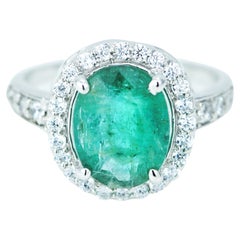 Natural 2.95 Carat Emerald Halo Ring