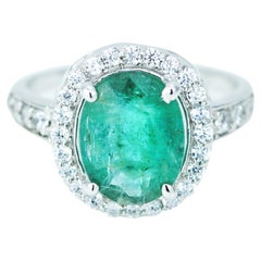 Natural 2.95 Carat Emerald Halo Ring