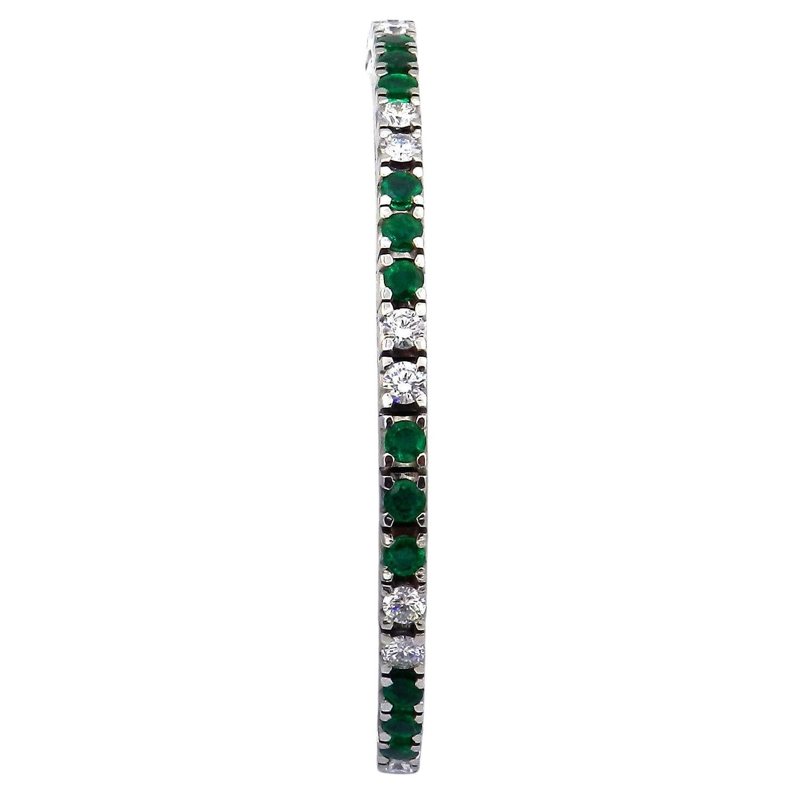 Natural 3 ct Emerald and 3.67ct Diamond  18K White Gold Tennis Bracelet

Classic, flowing emerald diamond rivière bracelet made of 18K/750 white gold, set with 27 natural emeralds, totaling approx. 3.05 ct, alternating with 18 diamonds, totaling