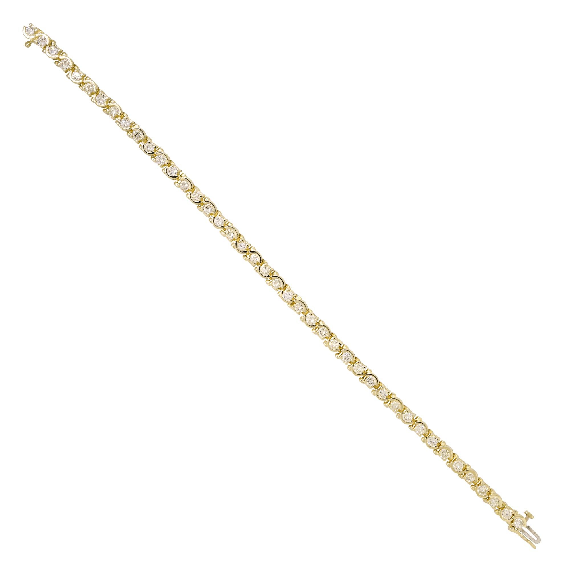 Natural 3.0 Carat Diamond Half Bezel-Set 14 Karat Tennis Bracelet

This classic diamond tennis bracelet features 3.0 carats of natural, round brilliant-cut diamonds, surrounded by half bezels made from 14-karat yellow-gold. We have been buying