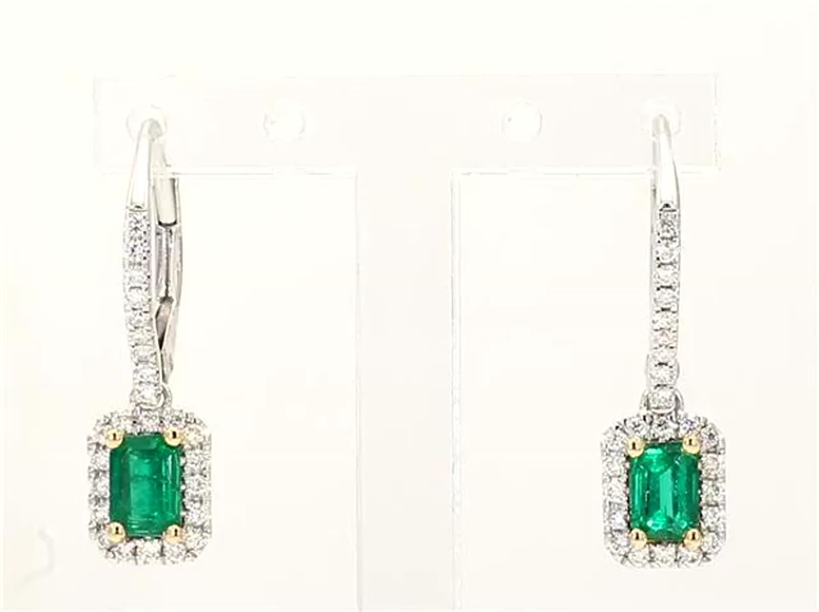 Emerald cut emeralds surrounded by round white diamonds in a beautiful single halo as well as along the earring. These earrings are designed to be in a simple setting. Can be used as a drop earring or in addition to your collection of jewels.

Total