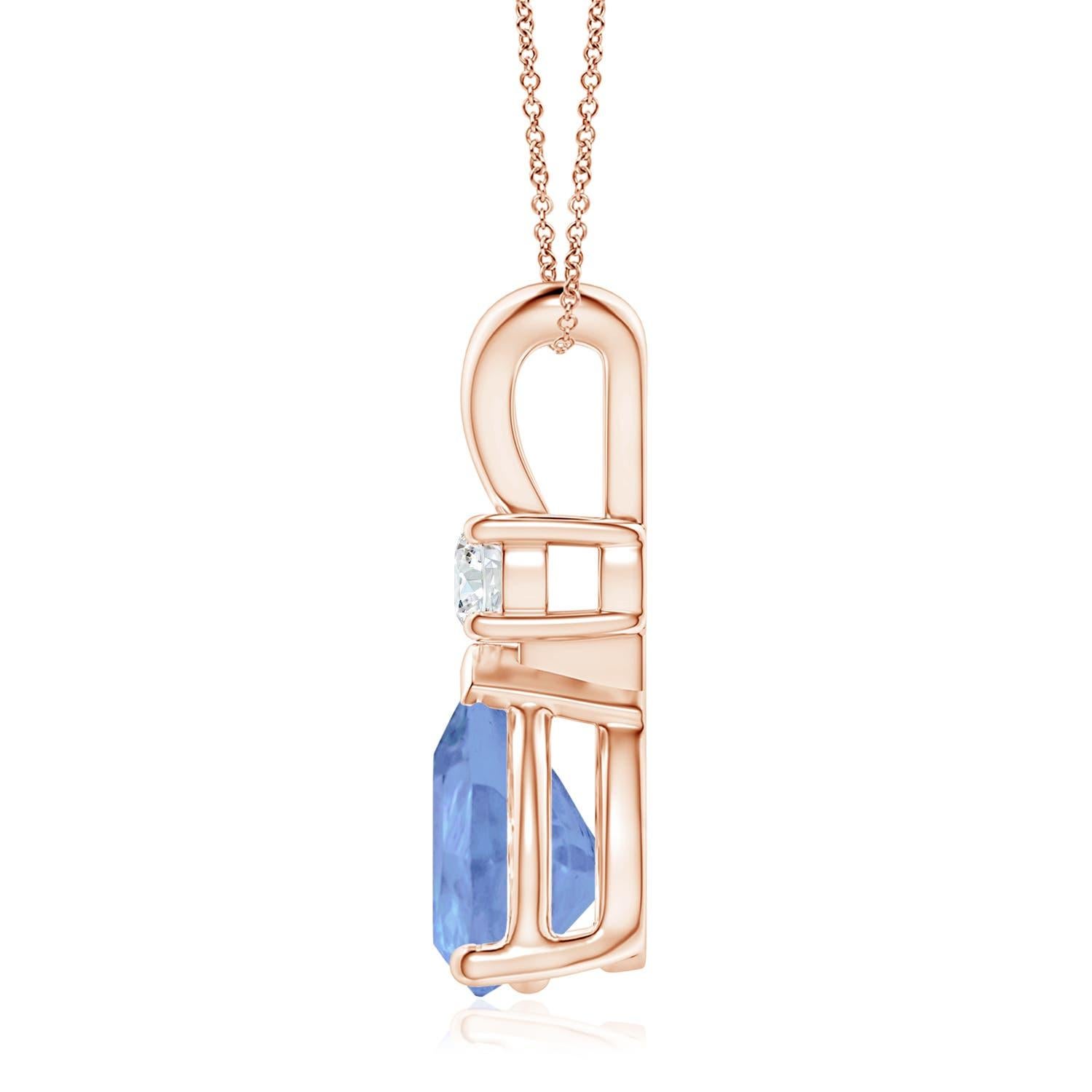 This classic solitaire pendant features a pear-shaped tanzanite secured in a prong setting. A glimmering round diamond sits atop the bluish-violet gemstone adding to the design's sparkle. Simple yet alluring, this tanzanite pendant in 14k rose gold