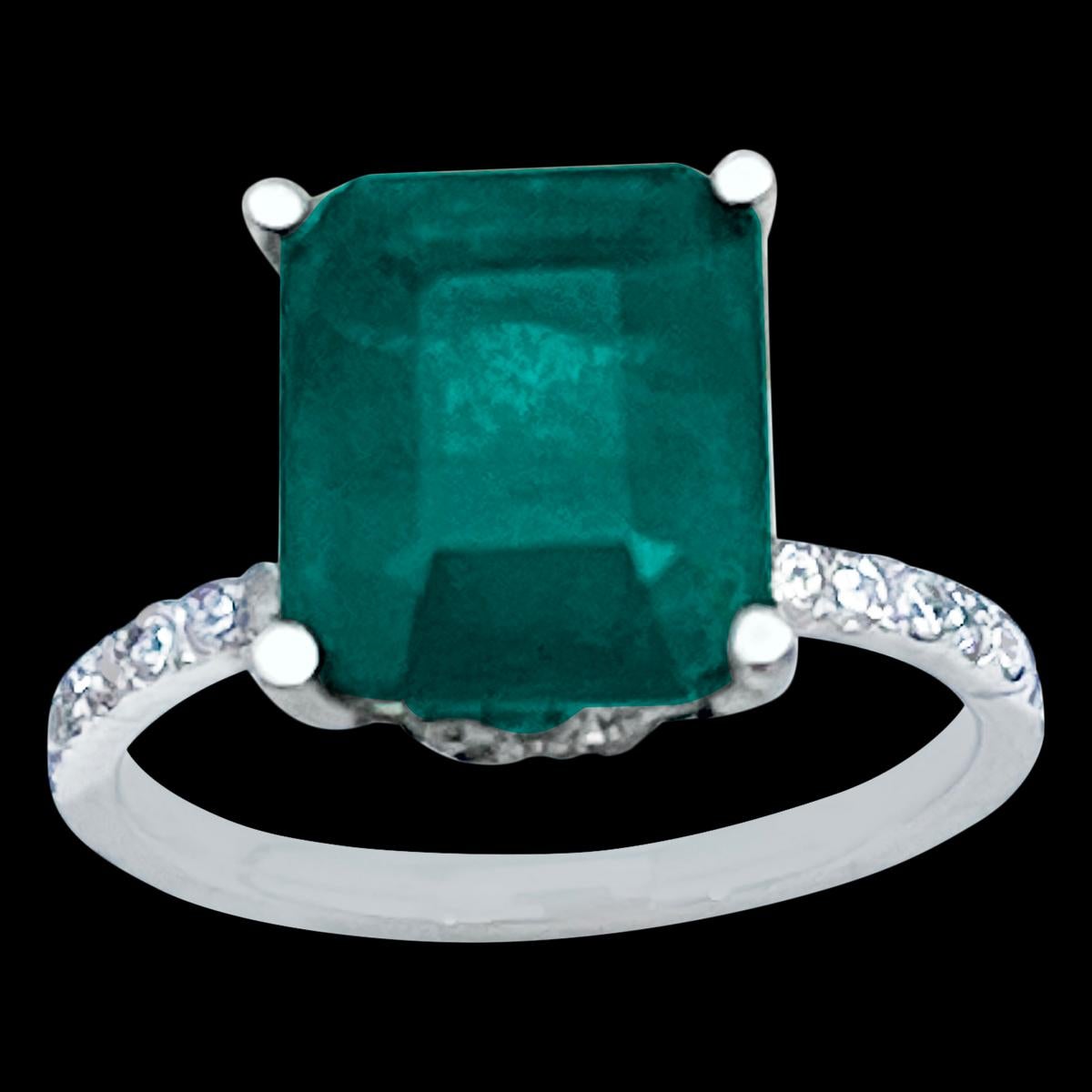 
Approximately Natural 3.2 Carat Emerald  Cut Emerald &  Diamond Ring 14 Karat white Gold , Size 5
A classic design  ring 
Approximately 3.2 Carat  Emerald Cut Emerald Absolutely gorgeous emerald , Very desirable color 
Gold 3.8   gm
 Diamonds: 