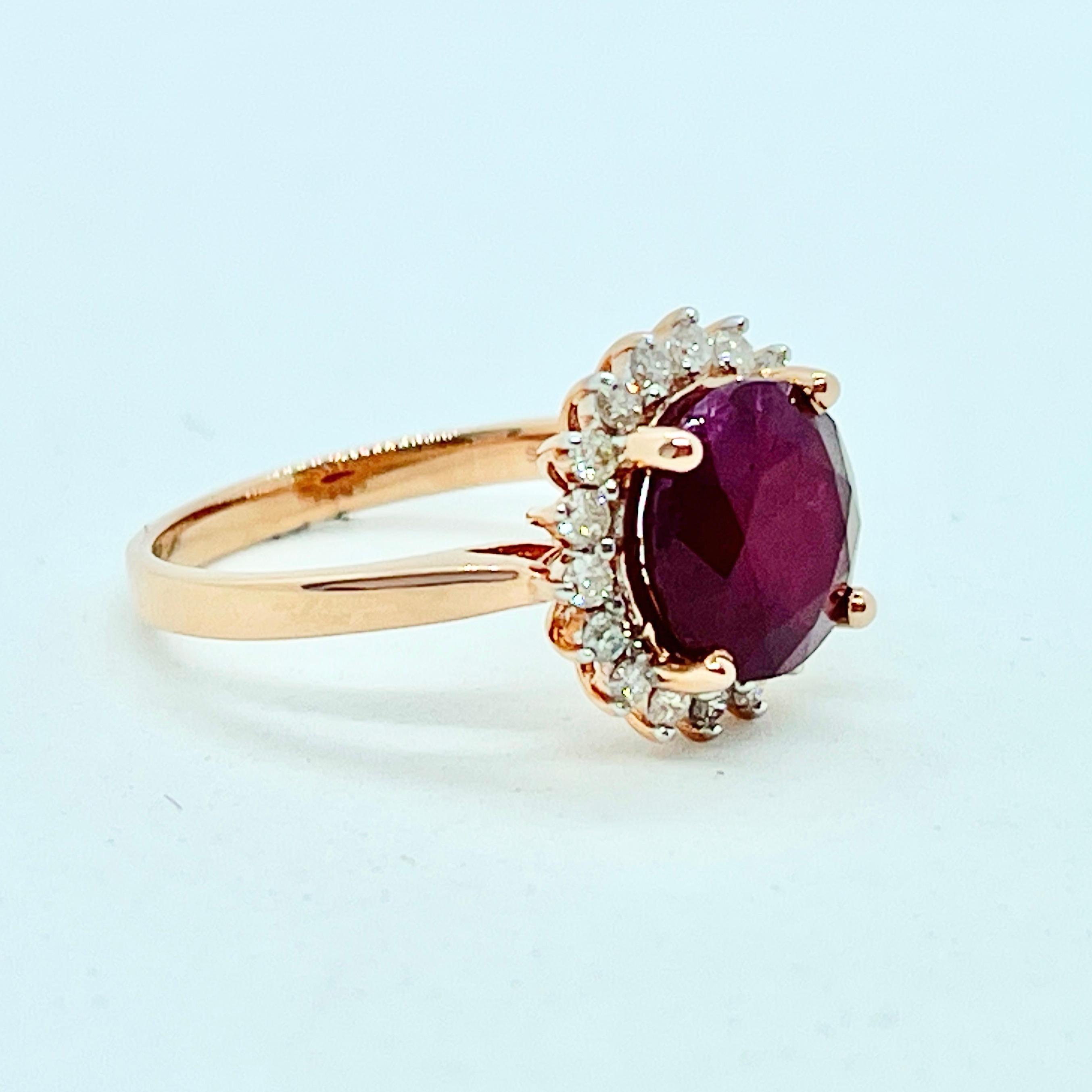 A Stunning Piece … Just look at the Colour!

This ring features a Natural Ruby surrounded with a halo of sparkly Diamonds.

The Ruby weighs approx 3.37ct with strong purplish/red colour and is set in 14ct rose gold. It has some small, silk