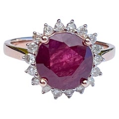 Natural 3.3 Carat Ruby and Diamond Halo Ring 14 Carat Rose Gold with Valuation