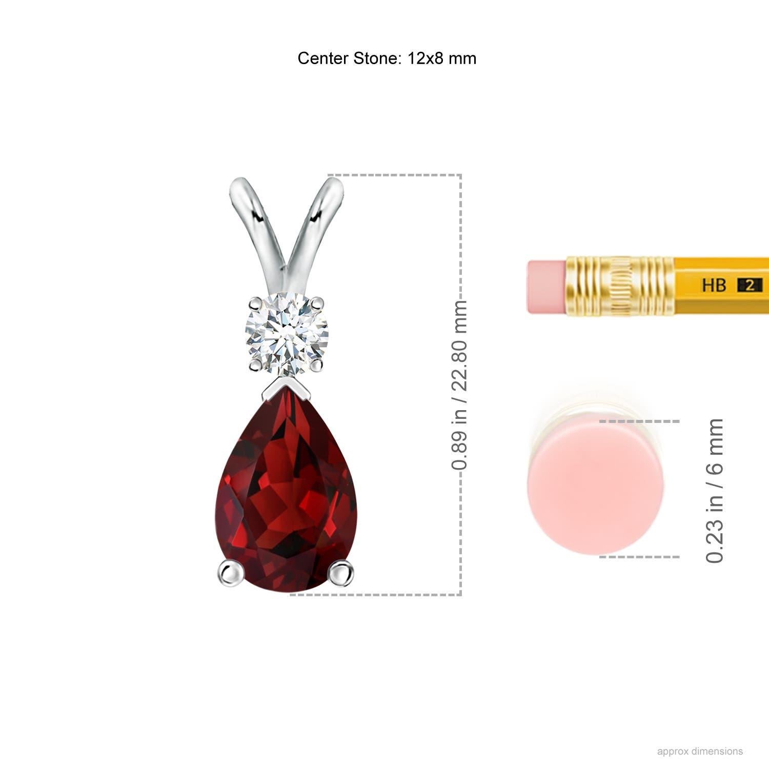 A pear-shaped intense red garnet is secured in a prong setting and embellished with a diamond accent on the top. Simple yet stunning, this teardrop garnet pendant with V bale is sculpted in 14k white gold.
