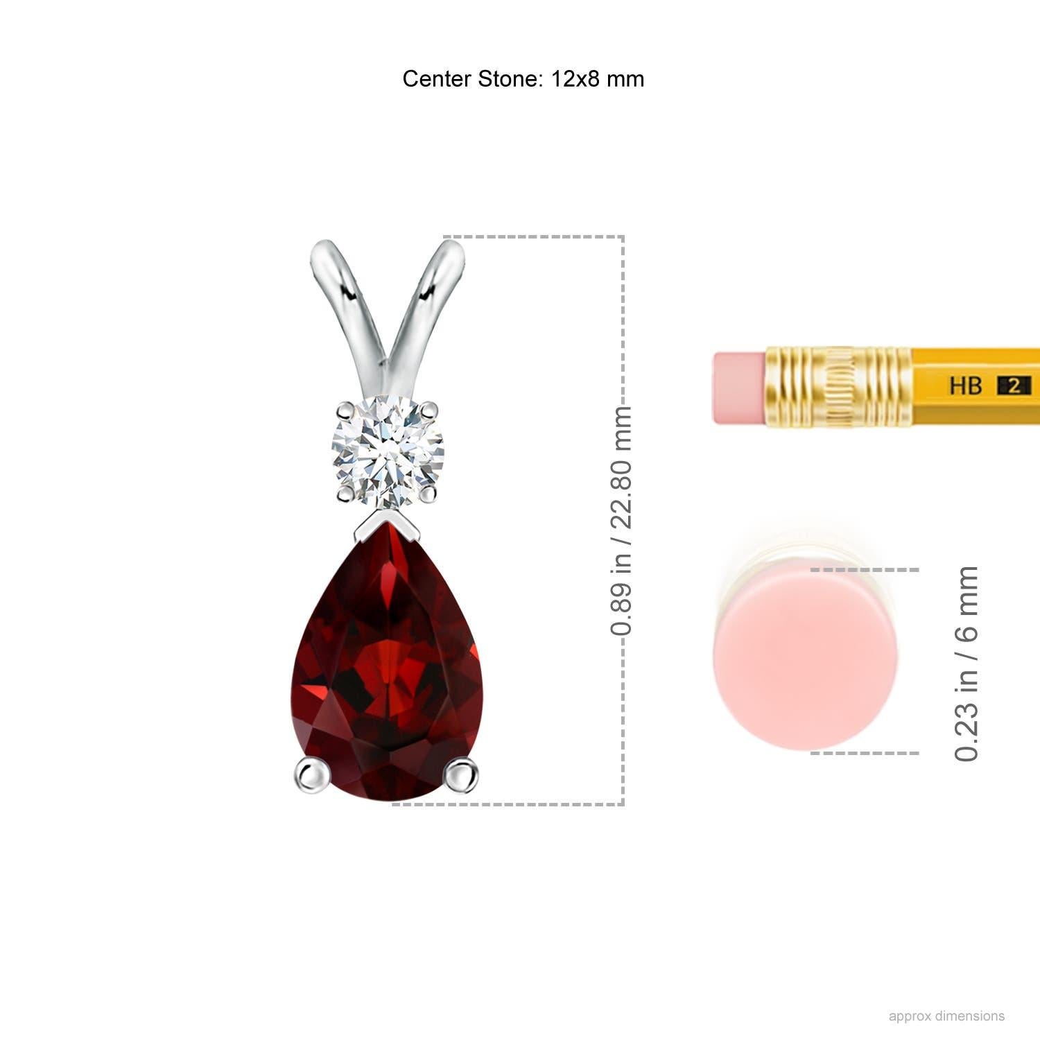 A pear-shaped intense red garnet is secured in a prong setting and embellished with a diamond accent on the top. Simple yet stunning, this teardrop garnet pendant with V bale is sculpted in platinum.