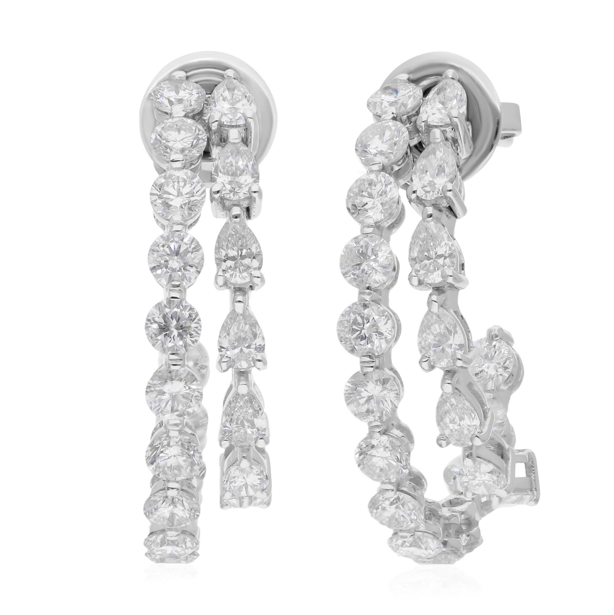 Cast from 14-karat gold, these exquisite earrings are handset with 3.66 carats of sparkling diamonds.

FOLLOW SPECTRUM JEWELS storefront to view the latest collection & exclusive pieces. Spectrum Jewels is proudly rated as a Top Seller on 1stdibs