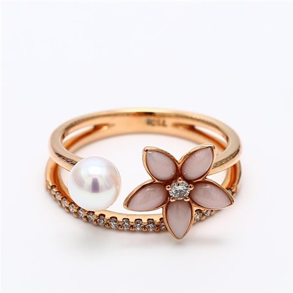 RareGemWorld's classic fashion ring. Mounted in a beautiful 18K Rose Gold setting with a natural white pearl, pink corralium secundum, and natural round white diamond melee. This ring is guaranteed to impress and enhance your personal