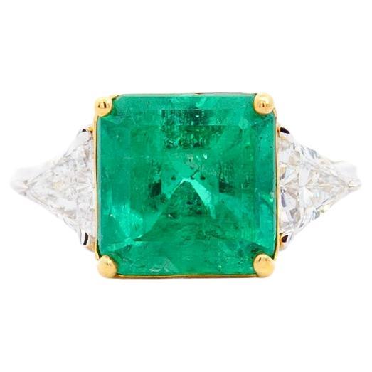 Natural 3.76 Carat Colombian Emerald with Diamond Side Stone 3-Stones Ring  For Sale