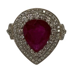 Natural 3.98 Carat Pear Shape Ruby and 1White Diamond Ring.
