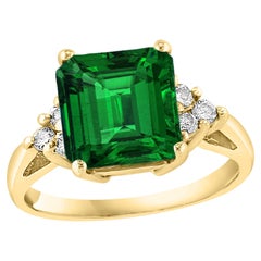 Natural 4 Carat Emerald Cut Emerald & 0.30 Carat Diamond Ring 14 Kt Yellow Gold