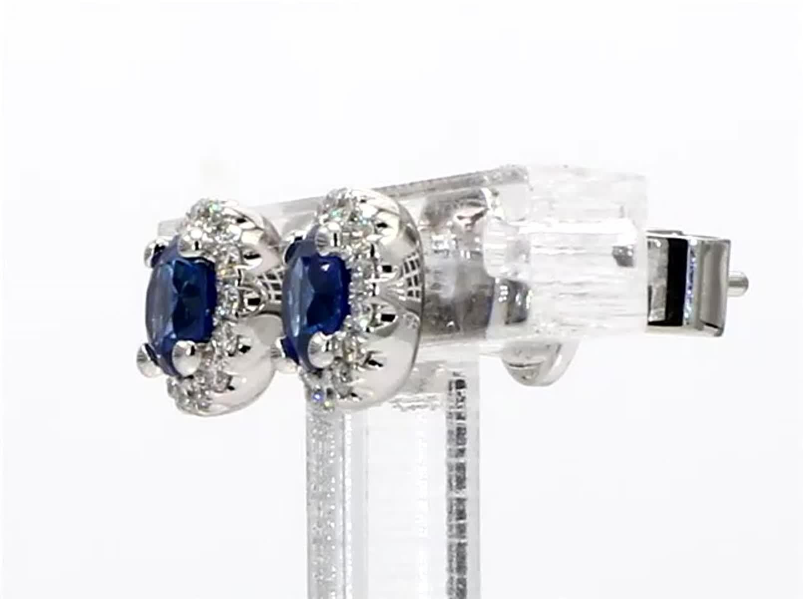 Contemporary Natural Blue Round Sapphire and White Diamond .96 Carat TW Gold Stud Earrings For Sale