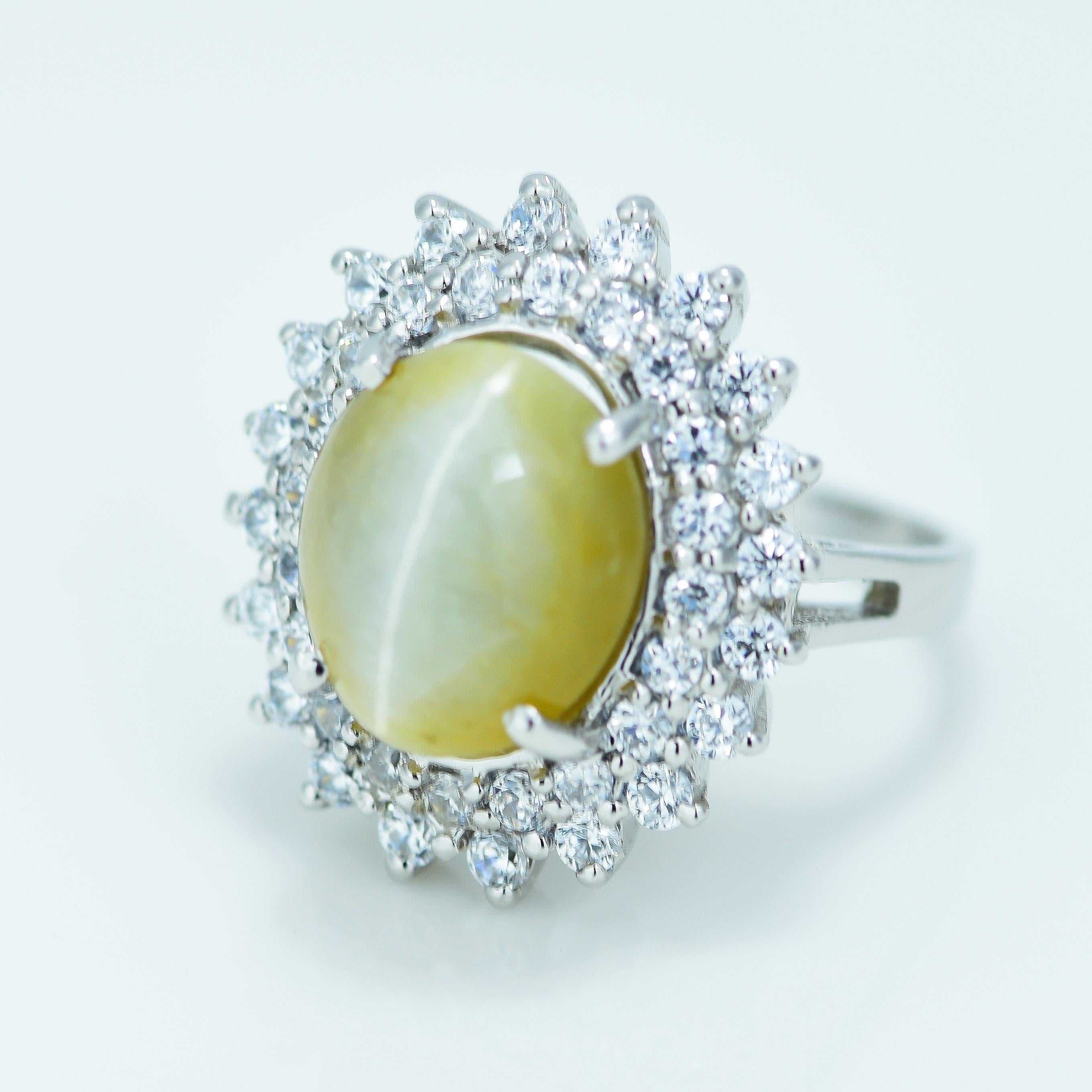 Modern Natural 4.12 Carat Cats Eye Double Halo Ring For Sale
