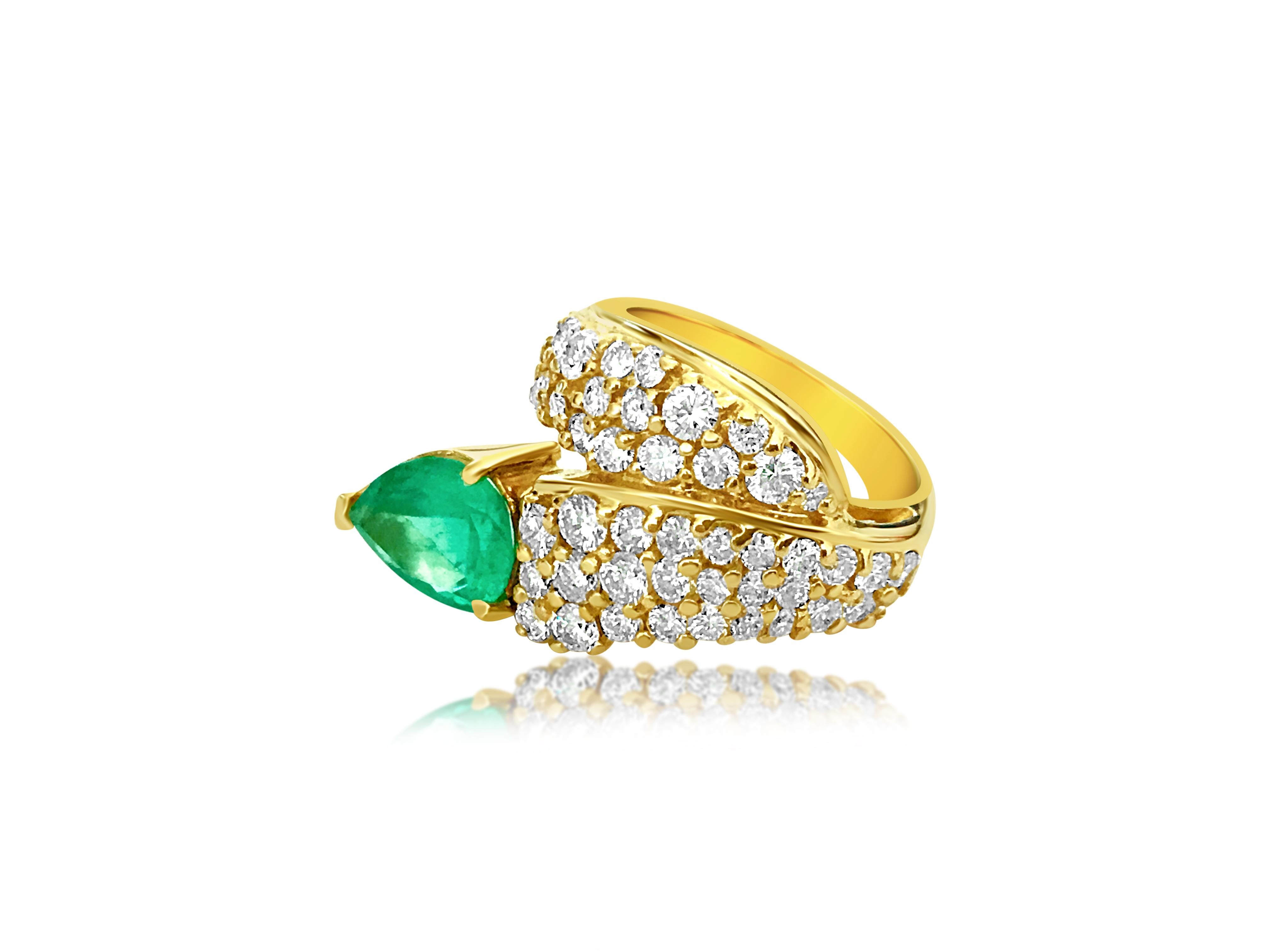Metal: 14k yellow gold. 

Emerald: 3.00 carats. 100% natural earth mined Colombian emerald. Pear shape emerald set in prongs. Strong color and saturation in the emerald. 

Diamonds: 100% natural earth mined and genuine. 
1.25 carat diamonds total.