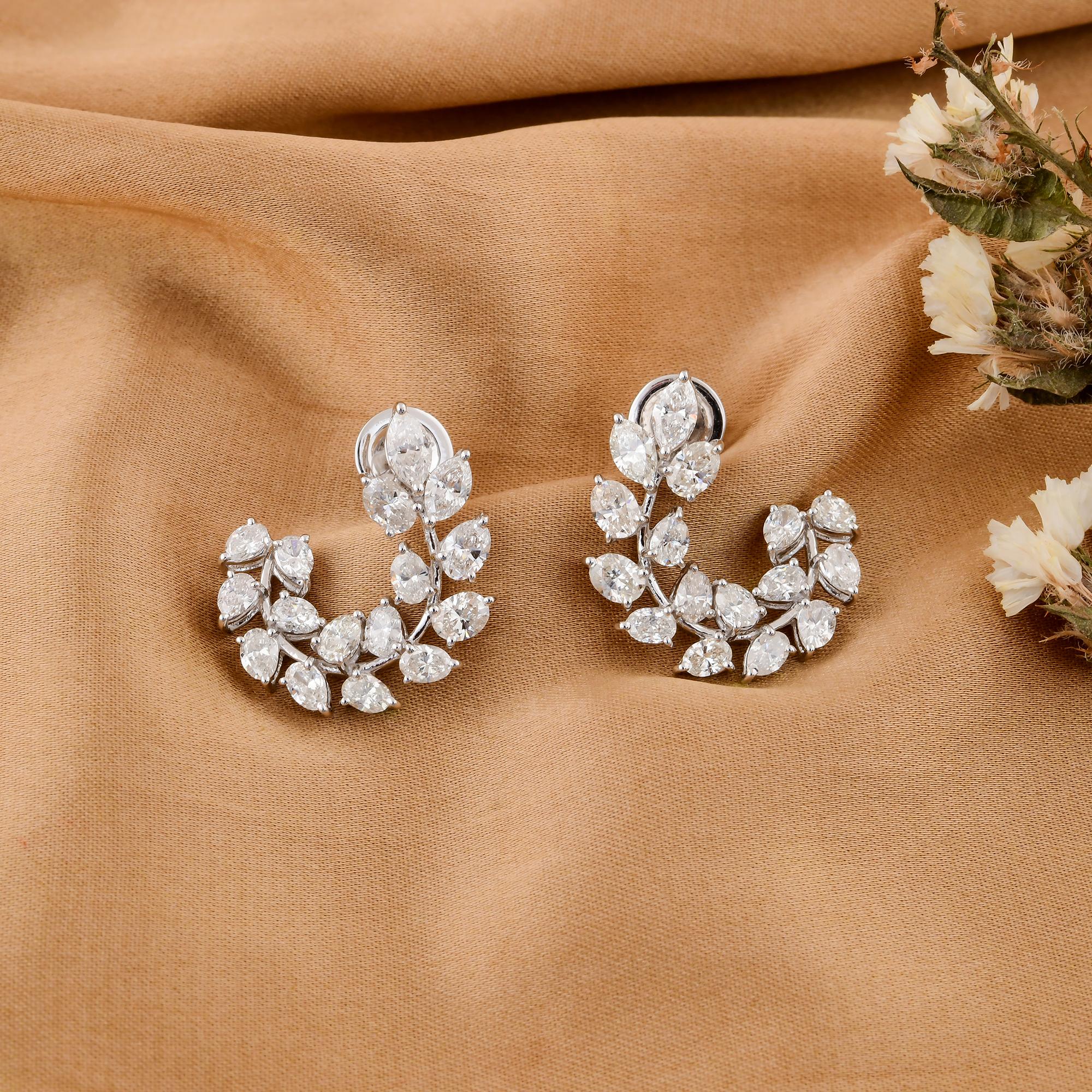 These Natural 4.25 Carat SI/H Oval Brilliant Cut Diamond Earrings are set in 14 Karat White Gold. The earrings feature a gross weight of 6.20 grams, with 5.35 grams of 14k white gold. The diamonds, totaling 4.25 carats, have an average clarity of