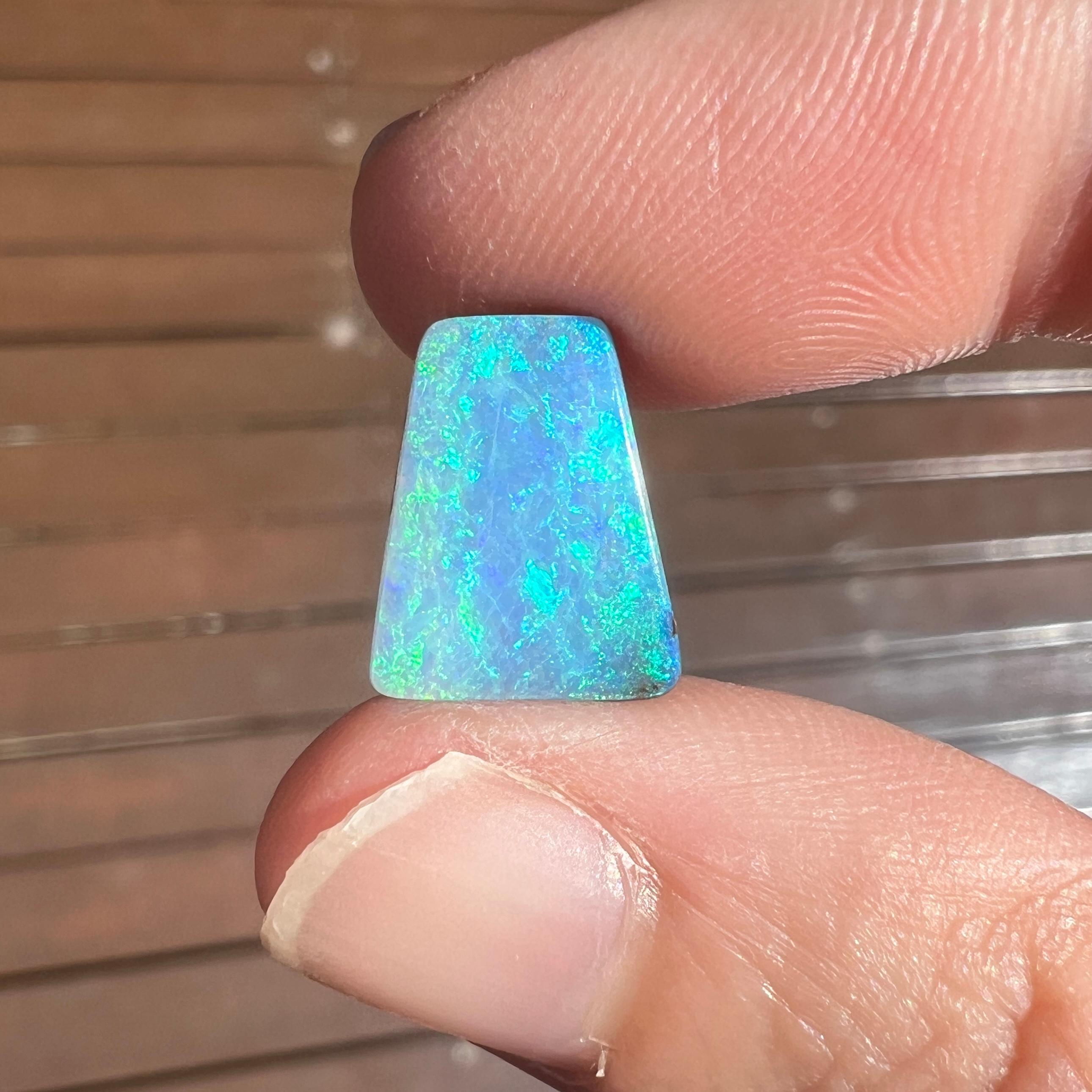This pretty 4.37 Ct Australian boulder opal was mined by Sue Cooper at her Yaraka opal mine in western Queensland, Australia in 2023. Sue processed the rough opal herself and cut into into a balanced shape. We love the ocean tones and colours