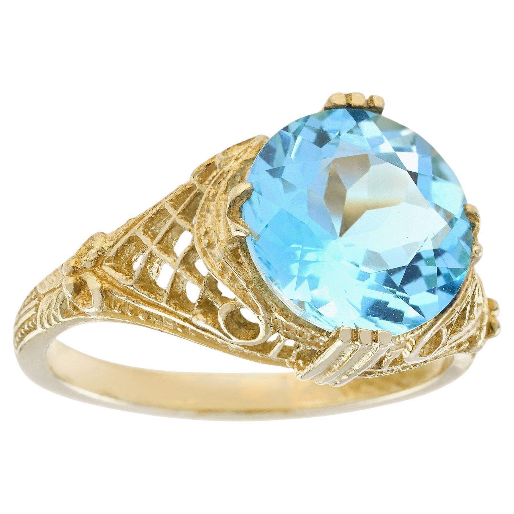 Natural 4.5 Ct. Blue Topaz Vintage Style Filigree Ring in Solid 9K Yellow Gold For Sale