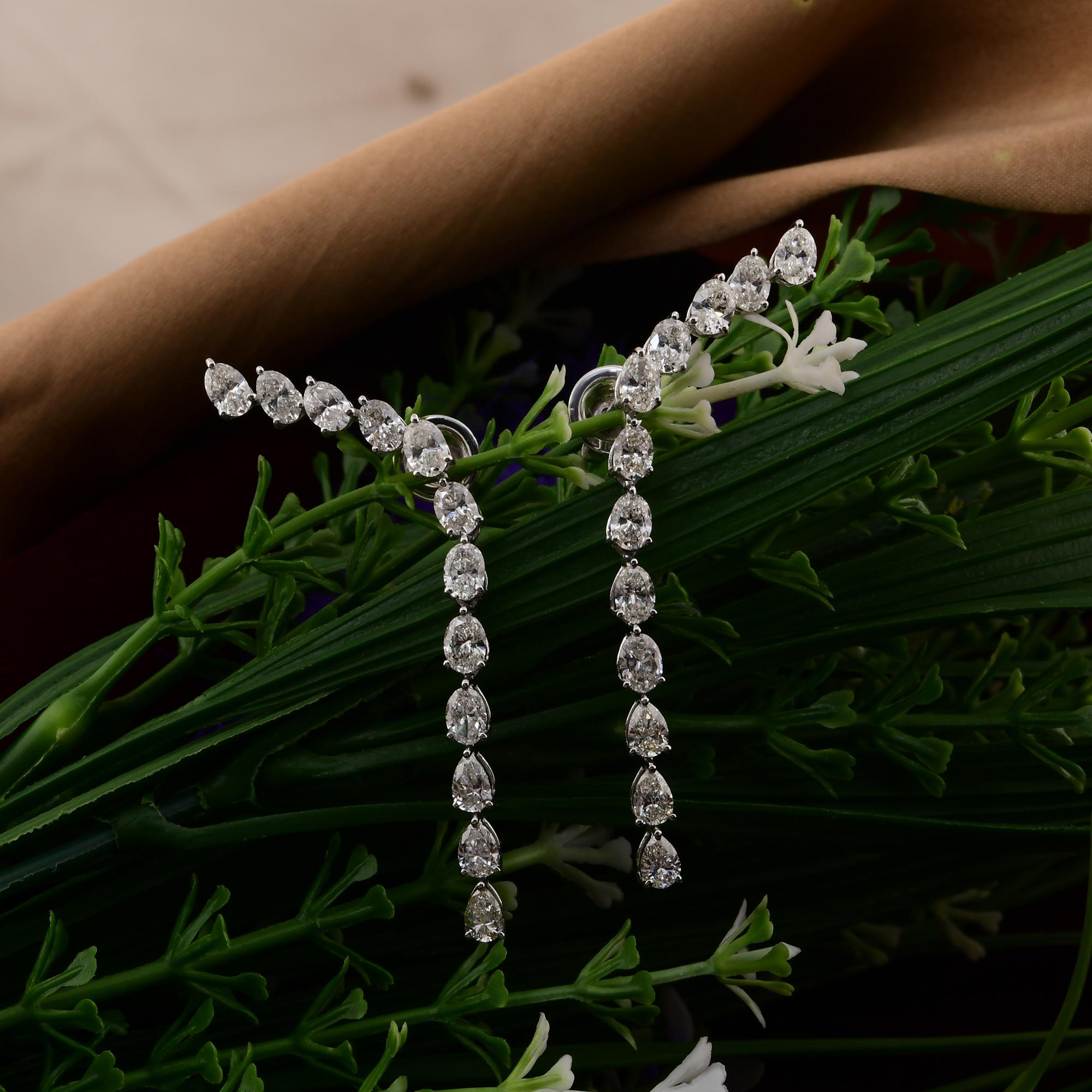 Coulées dans de l'or 14 carats, ces boucles d'oreilles exquises sont serties de 1,00 carat de diamants étincelants.

Suivez la vitrine de Spectrum Jewels pour découvrir la dernière collection et les pièces exclusives. Spectrum Jewels est fièrement