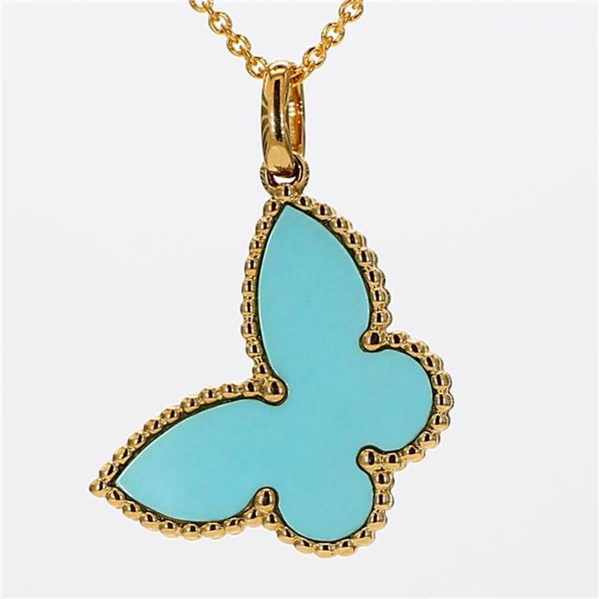 RareGemWorld's classic turquoise and pearl pendant. Mounted in a beautiful 18K Yellow Gold setting with a butterfly shape natural turquoise and a butterfly shape natural pearl. This pendant is guaranteed to impress and enhance your personal