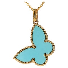 Natural Butterfly Shape Turquoise / Pearl .49 Carat TW Yellow Gold Pendant