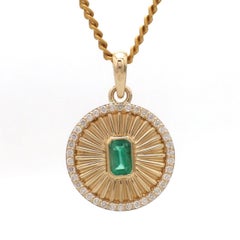 Collana con smeraldo Nature 4cts e diamante 0,21cts in oro 14k