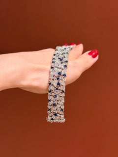 Natural 5 carat Blue Sapphire and 18 carat Diamond Bracelet in 18K White Gold