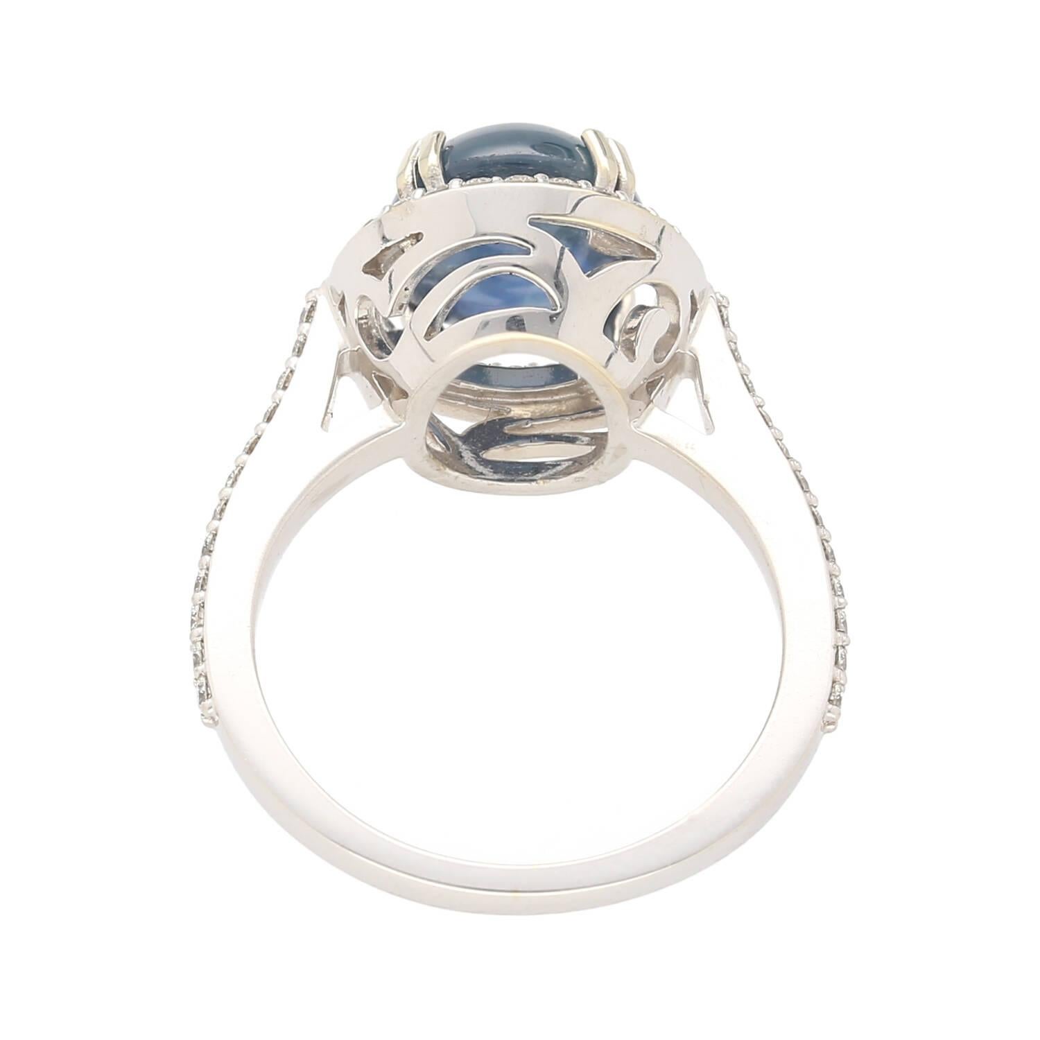 Round Cut Natural 5 Carat Blue Star Sapphire Ring with Diamond Side Stones in 14K Gold For Sale