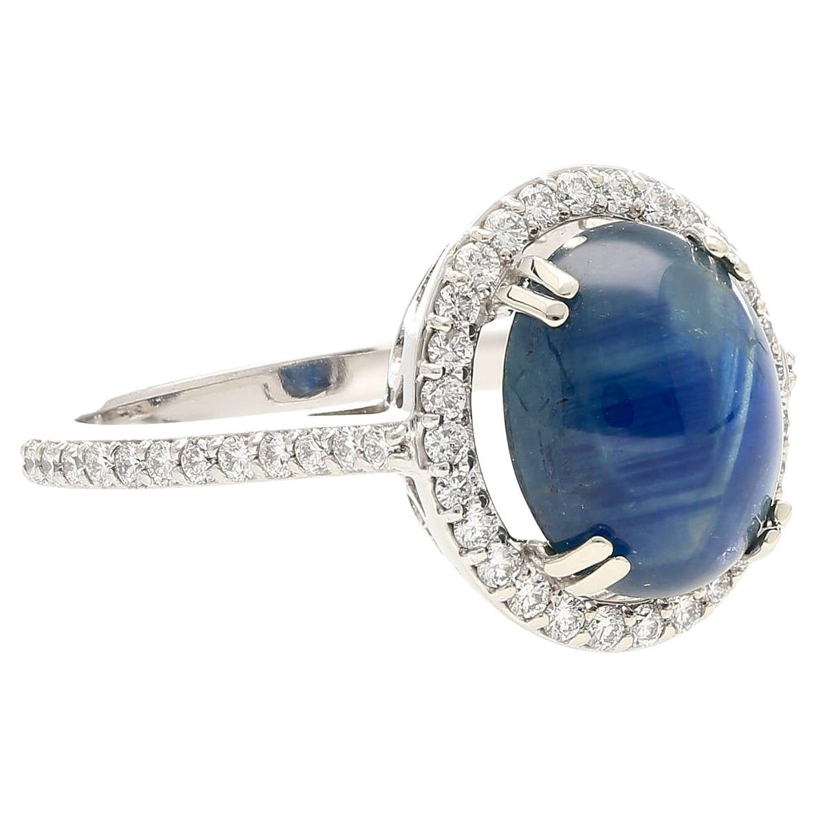 Natural 5 Carat Blue Star Sapphire Ring with Diamond Side Stones in 14K Gold For Sale